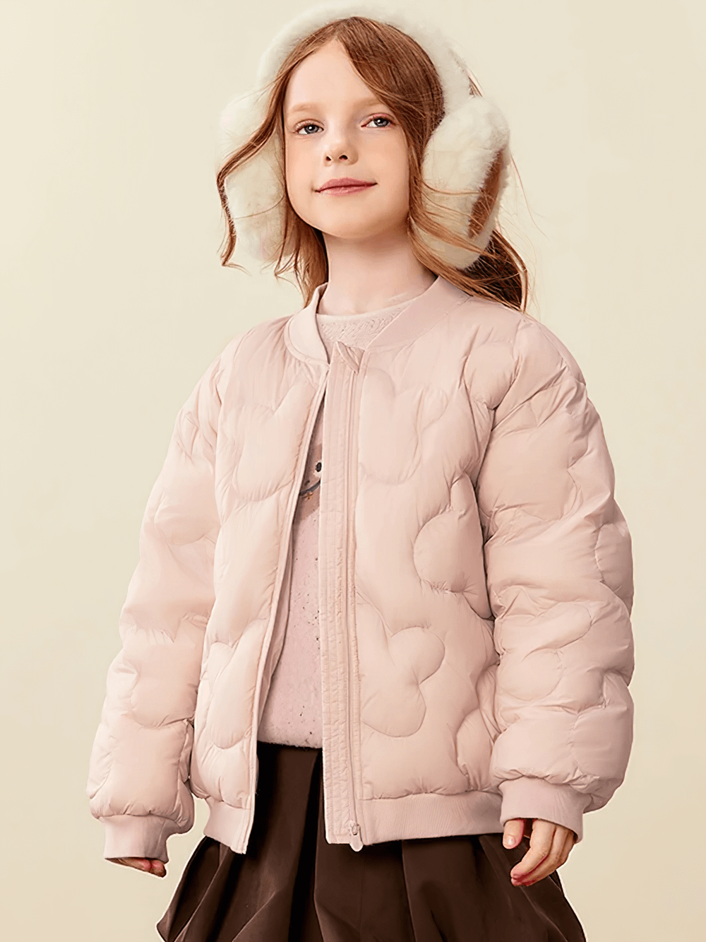 Child wearing Kids Windproof Down Jacket with Cloud Design - SF3703, showcasing quilted cloud pattern and soft collar for warmth.