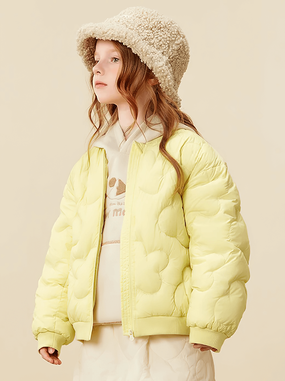 Child wearing Kids Windproof Down Jacket with Cloud Design - SF3703, showcasing its soft and cozy quilted style, perfect for cool weather.