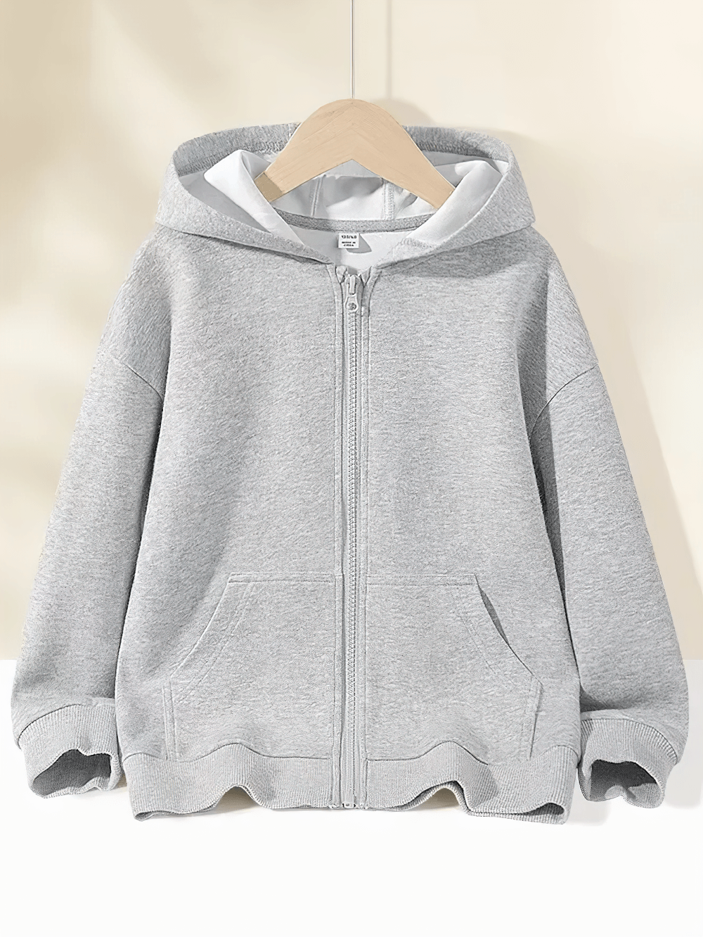 Kids Zip Up Hoodie with Pockets and Everyday Style - SF3670 in light gray, displayed on a hanger showcasing its front design.