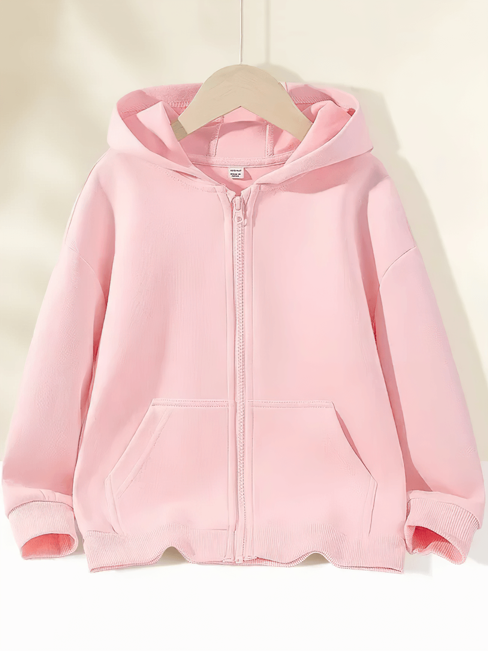 Kids Zip Up Hoodie with Pockets and Everyday Style - SF3670 in light pink displayed on a hanger, perfect for casual wear.