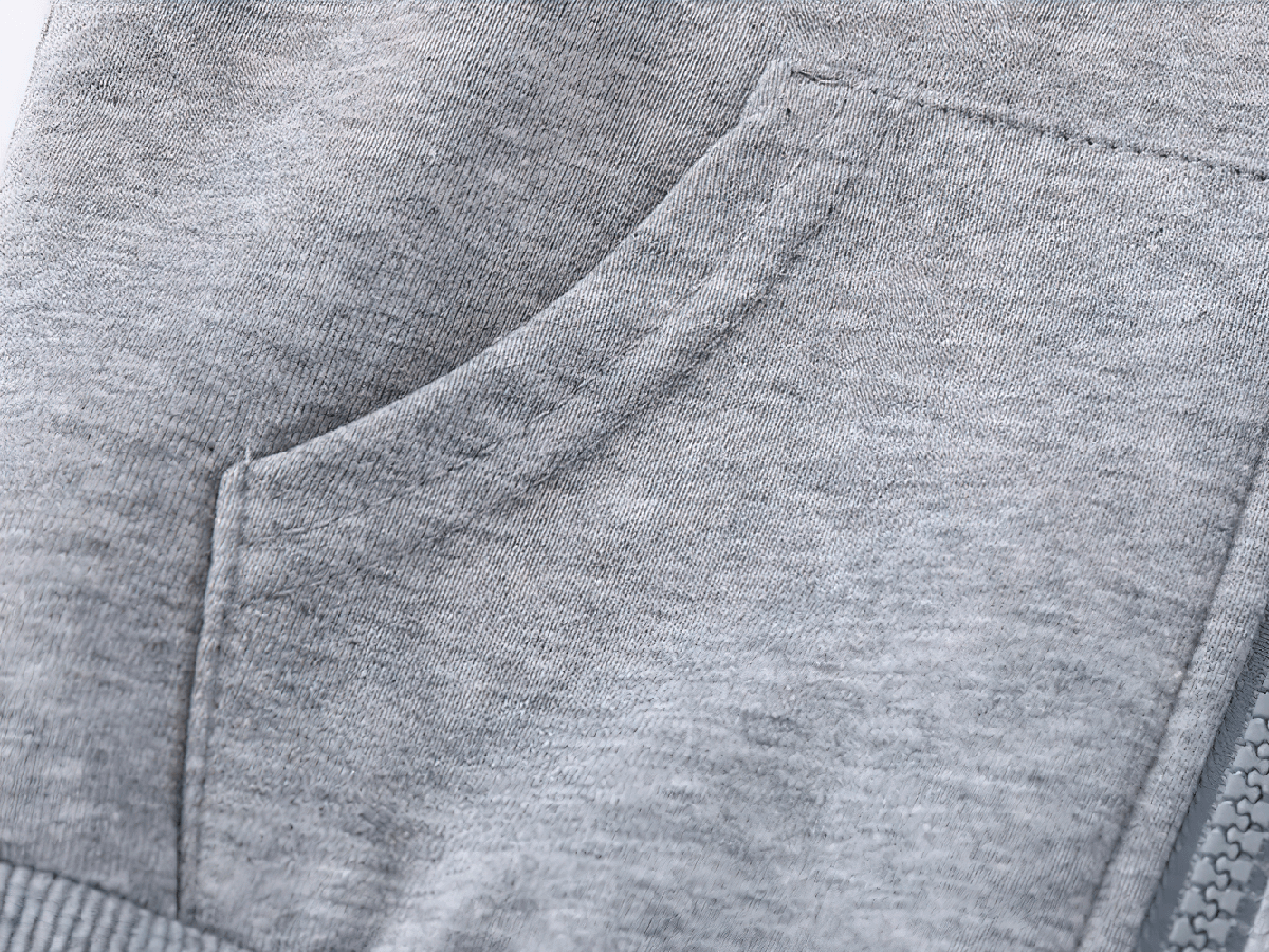 Close-up of Kids Zipper Soft Hoodie with Striped Sleeves - SF3768 showing pocket and zipper details in gray fabric.