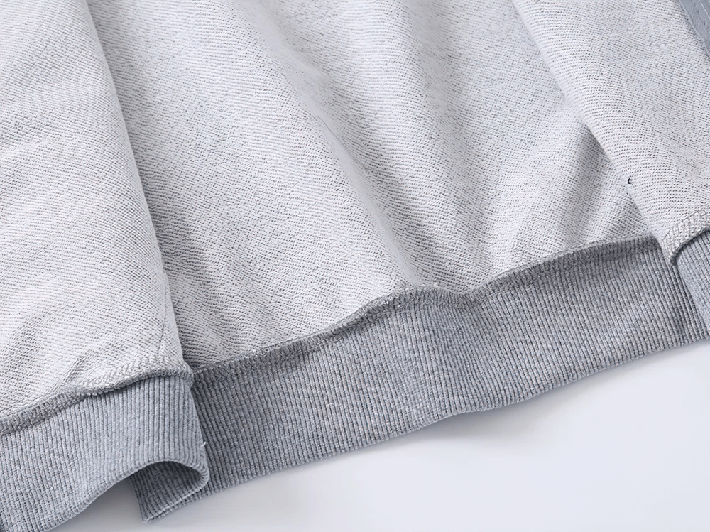 Close-up of Kids Zipper Soft Hoodie with Striped Sleeves - SF3768 showing ribbed hem detail for a secure and comfy fit in light grey.