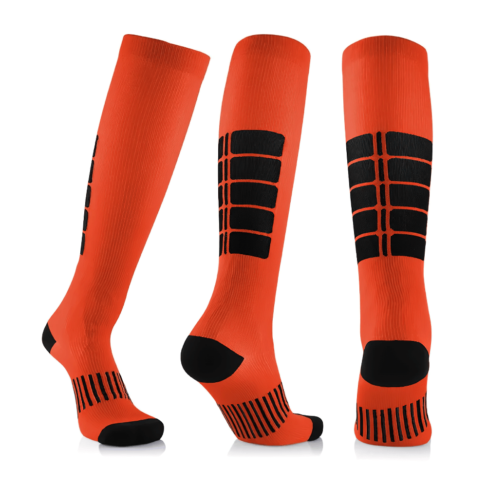 Bright orange knee-high sports socks with black compression detailing for cycling and running performance enhancement.