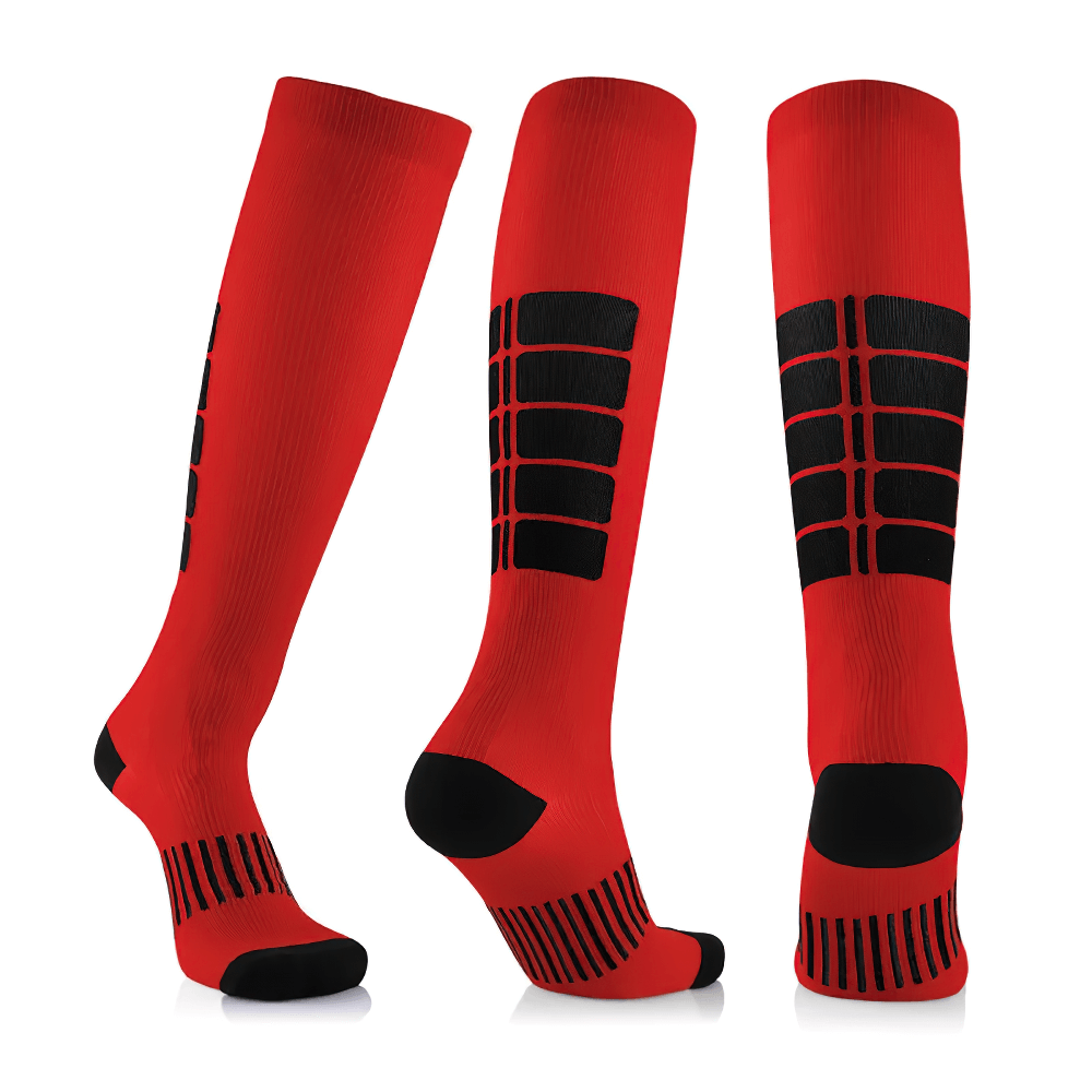 Red knee-high compression sports socks for cycling and running, featuring black grip patterns for enhanced performance and support.