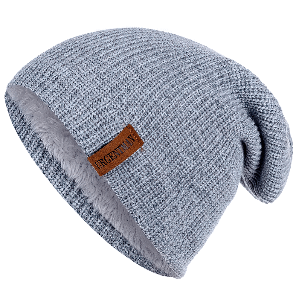 Knitted unisex winter beanie with fur lining, perfect for warmth and style during skiing and outdoor adventures. Acrylic material.