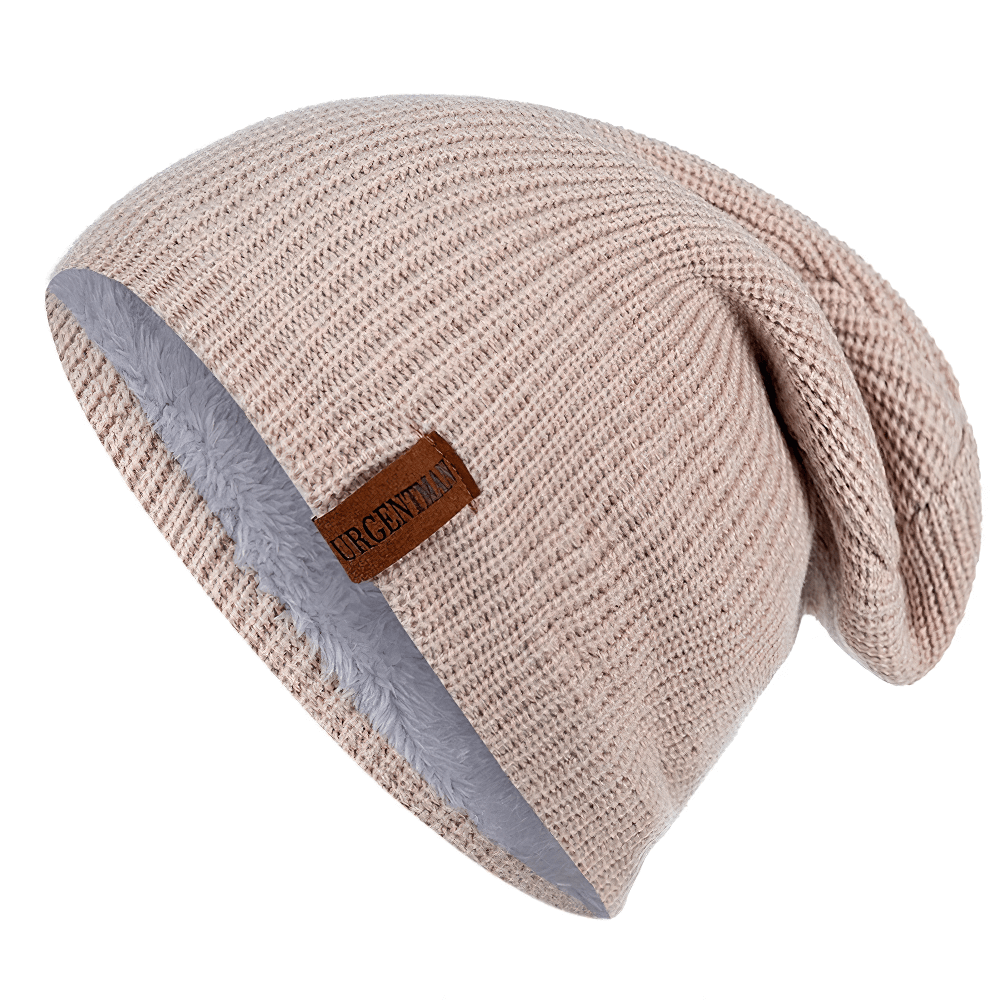 Alt Tag: Unisex fur-lined winter beanie hat in neutral color, perfect for warmth and style on ski trips and outdoor adventures.