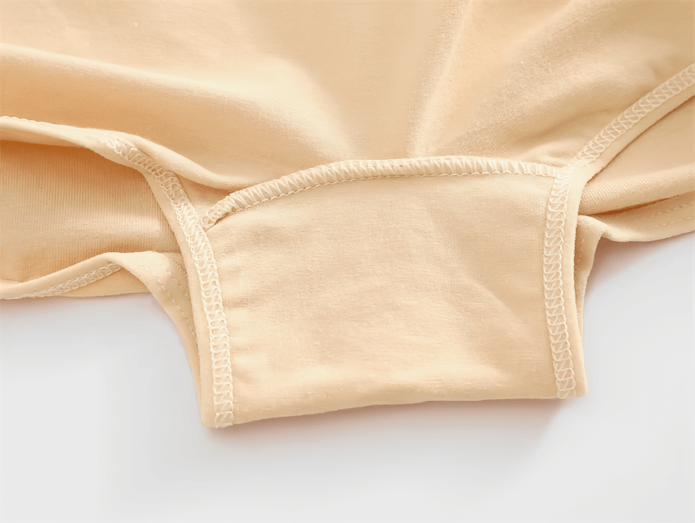 Close-up of breathable cotton lace boyshort panties showcasing the soft, stretchy fabric and delicate lace trim for everyday wear.