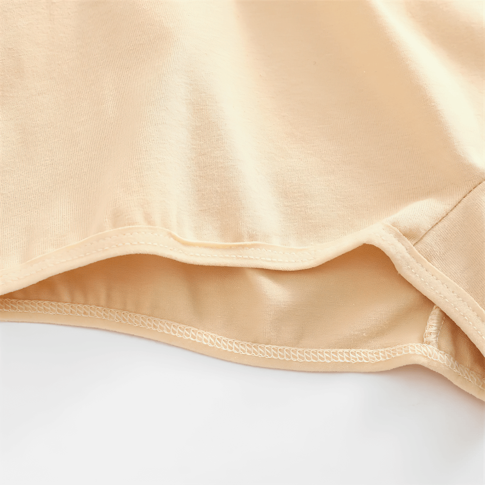 Close-up of lace trim boyshort panties in beige, showcasing soft cotton fabric and elegant lace waistband. Perfect for everyday comfort.