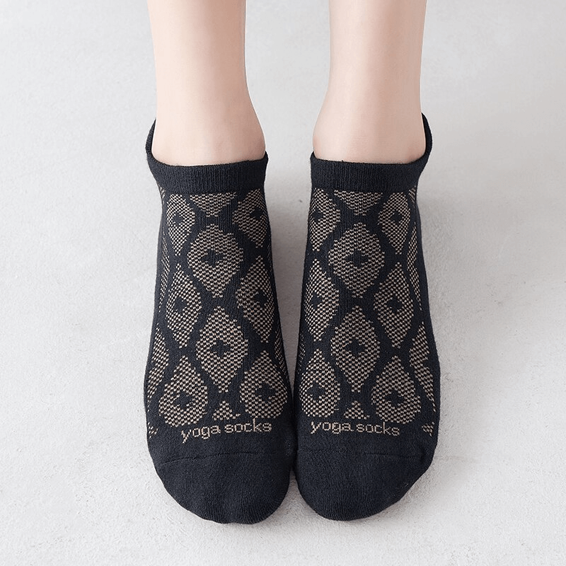 Stylish black breathable cotton Pilates socks with anti-slip design for women, perfect for yoga or casual sports activities.