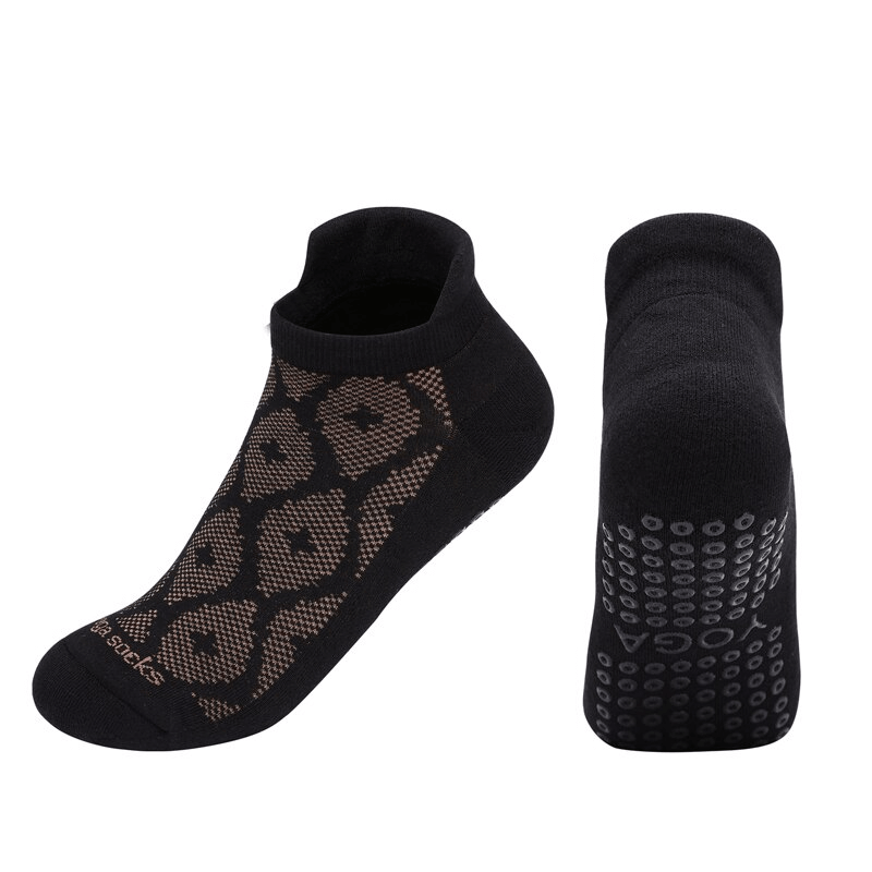 Black ladies breathable anti-slip cotton Pilates socks with leopard pattern and grip sole, perfect for casual sports activities.
