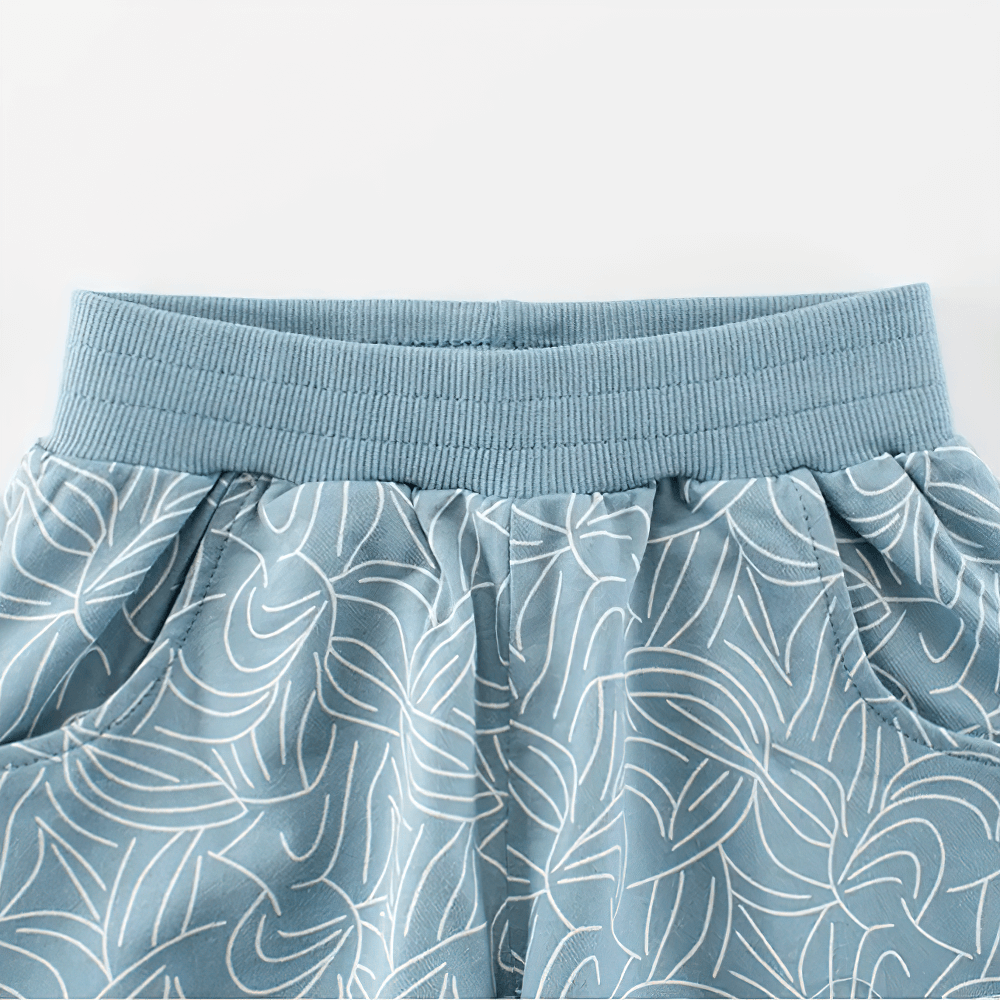 Leaf Print Shorts with Elastic Waist and Pockets - SF3790 for girls, featuring a light blue leaf pattern, soft waistband, and convenient pockets.