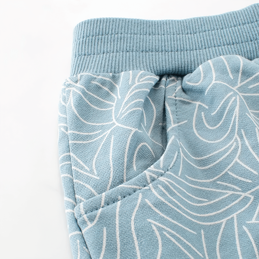 Close-up of blue Leaf Print Shorts with Elastic Waist and Pockets - SF3790, featuring a stylish leaf pattern and practical pocket design.