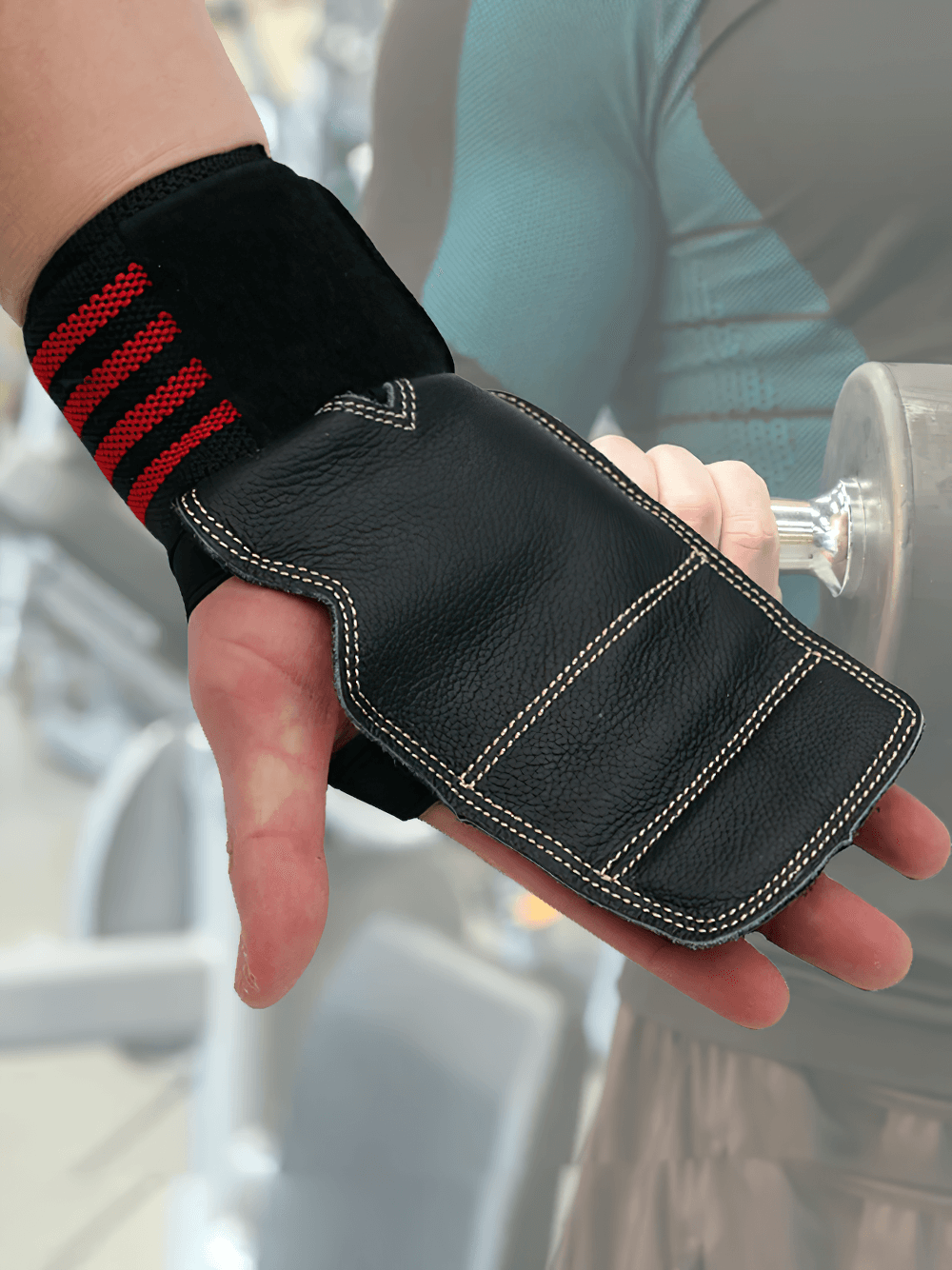 Close-up of Leather Gym Grips with Straps for Pull-ups - SF3545 showcasing durable leather and adjustable straps in action during a workout.