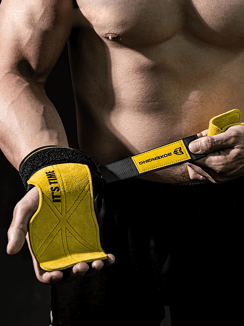 Man adjusting Leather Gym Grips with Wrist Straps for Powerlifting - SF3516, showcasing anti-skid pads and reinforced stitching.