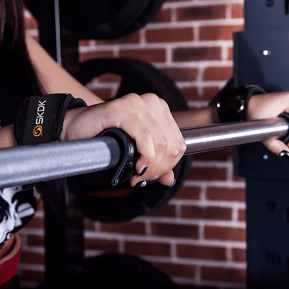 Leather Gym Hand Grips with Adjustable Strap - SF3544 used for secure grip during workout.