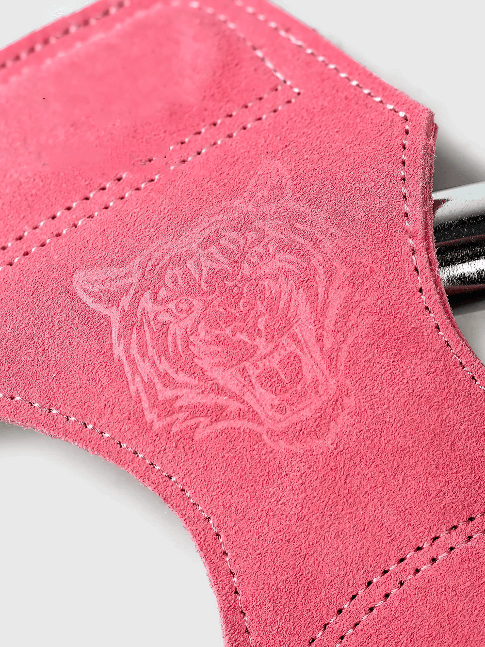Close-up of pink cowhide Leather Gym Hand Grips with Wrist Support Straps - SF3519 featuring a tiger design, perfect for weight lifting.
