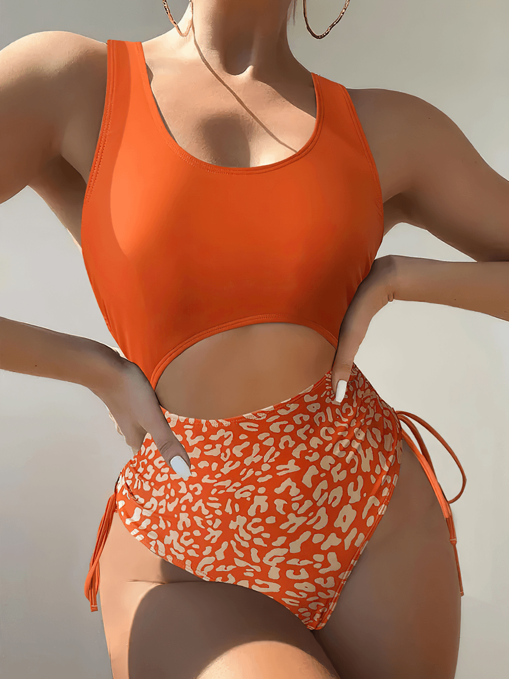 Leopard Print Cut Out High Waist One Piece Swimwear - SF4688 modeled by a woman wearing vibrant orange and leopard print.