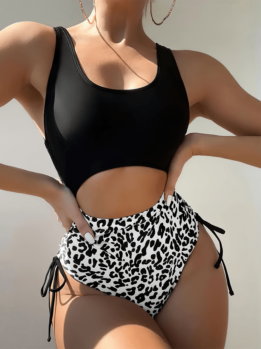 Leopard Print Cut Out High Waist One Piece Swimwear - SF4688 showcasing trendy black and white design and adjustable side drawstrings.