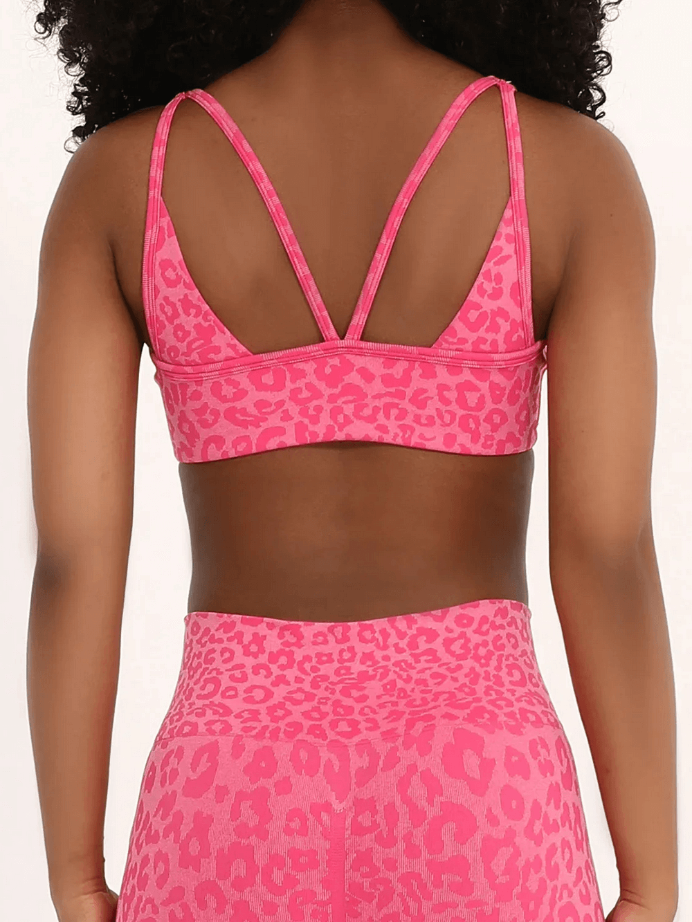 Back view of Leopard Print Deep V Yoga Bra with Back Straps - SF4077 in pink, showcasing trendy straps and stylish leopard pattern.