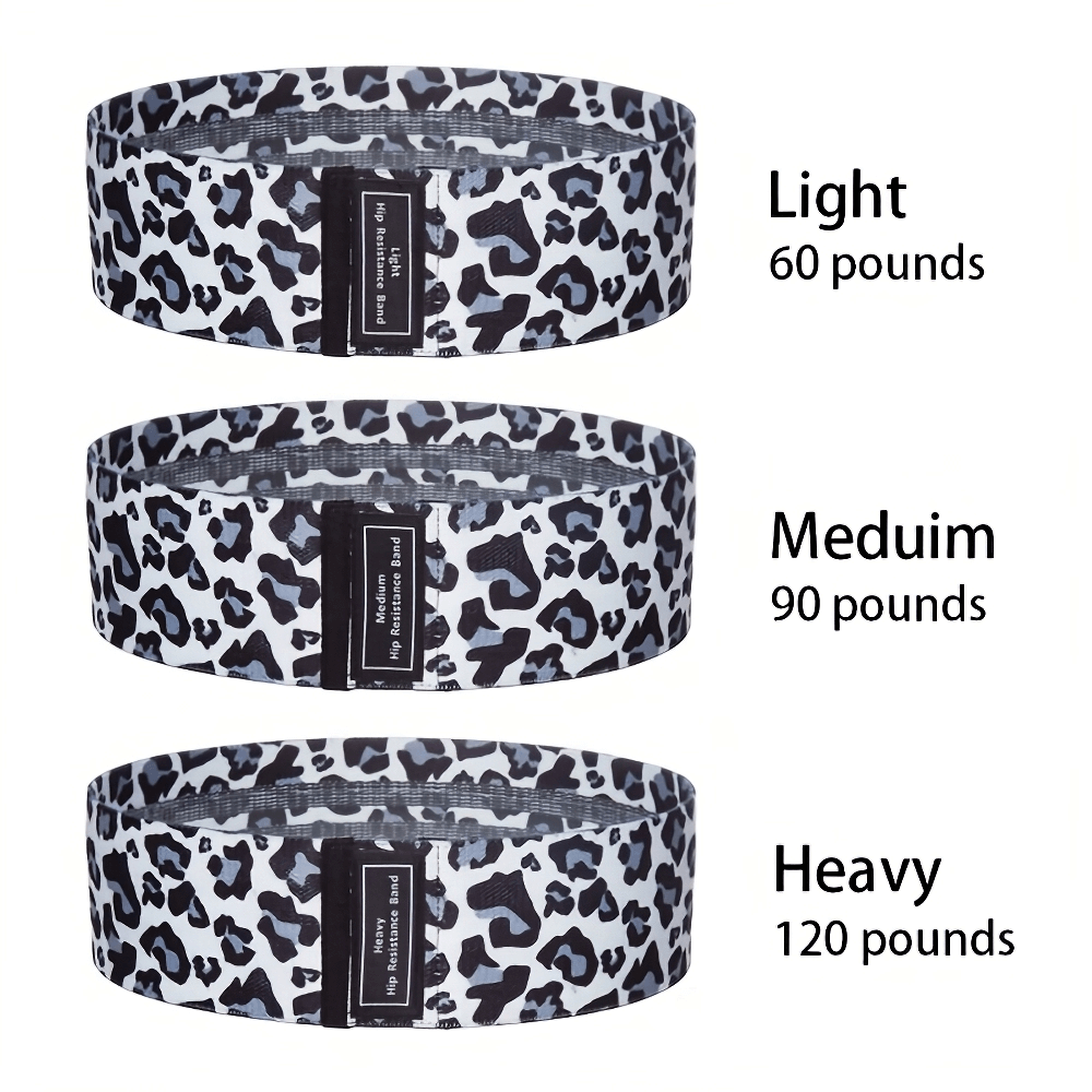 Leopard print resistance bands set with three levels: light (60 lbs), medium (90 lbs), and heavy (120 lbs), perfect for workouts.