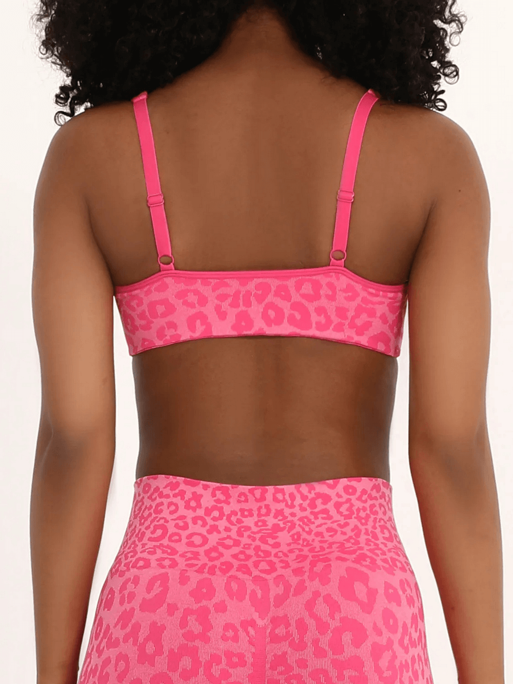 Back view of Leopard Print Sports Bra with Adjustable Straps - SF4086 in pink, showcasing stylish active wear for women.