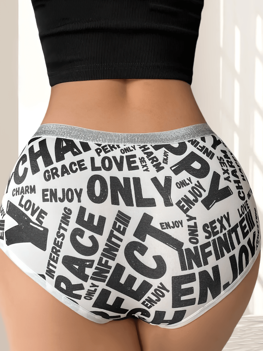 Letter Print Shiny Boyshort Underwear for Women - SF4664 showcased with bold black words on a shiny white base.