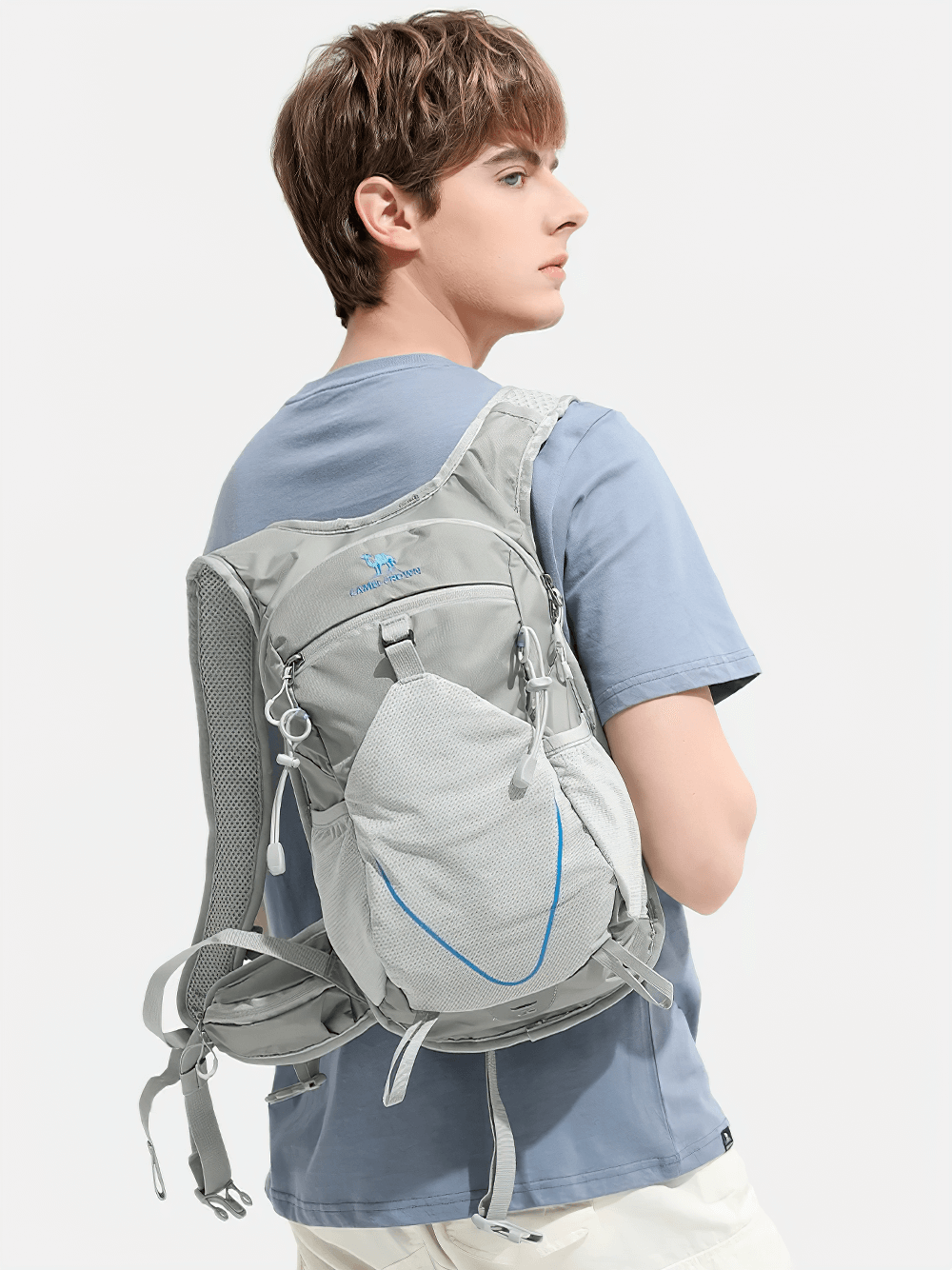 Man wearing Lightweight 15L Water-Repellent Cycling Backpack SF2295 with adjustable straps and mesh pocket, ideal for outdoor adventures.