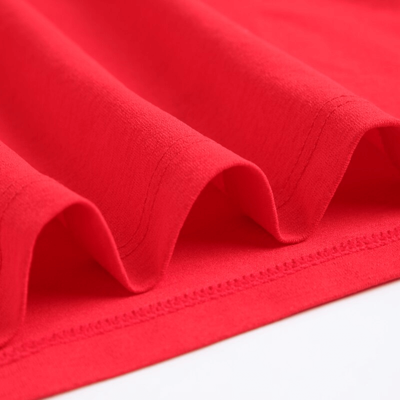 Close-up of lightweight elastic red sports fabric, highlighting softness and breathable quality of men's training T-shirt SF1514.