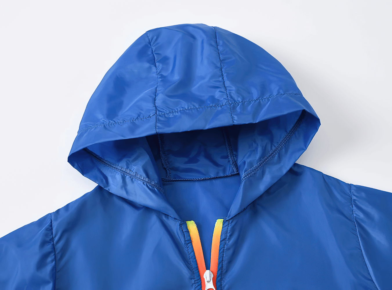 Vibrant blue Lightweight Hooded Windbreaker with Rainbow Zipper - SF3635, perfect for boys' outdoor activities and stylish wear.