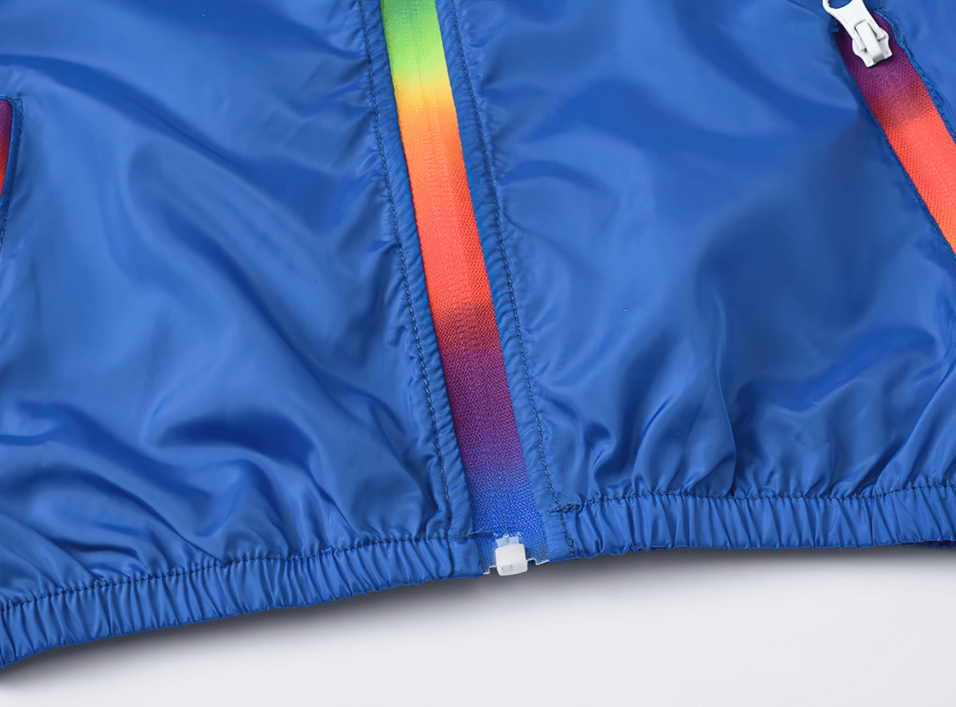Lightweight Hooded Windbreaker with Rainbow Zipper - SF3635 showing colorful zip on blue fabric for stylish kids' outerwear.