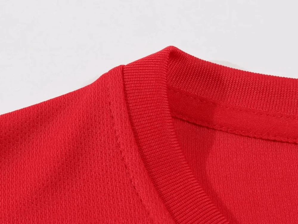 Close-up of red O-neck collar on men's athletic T-shirt, showcasing breathable polyester fabric from the lightweight SF2025 set.