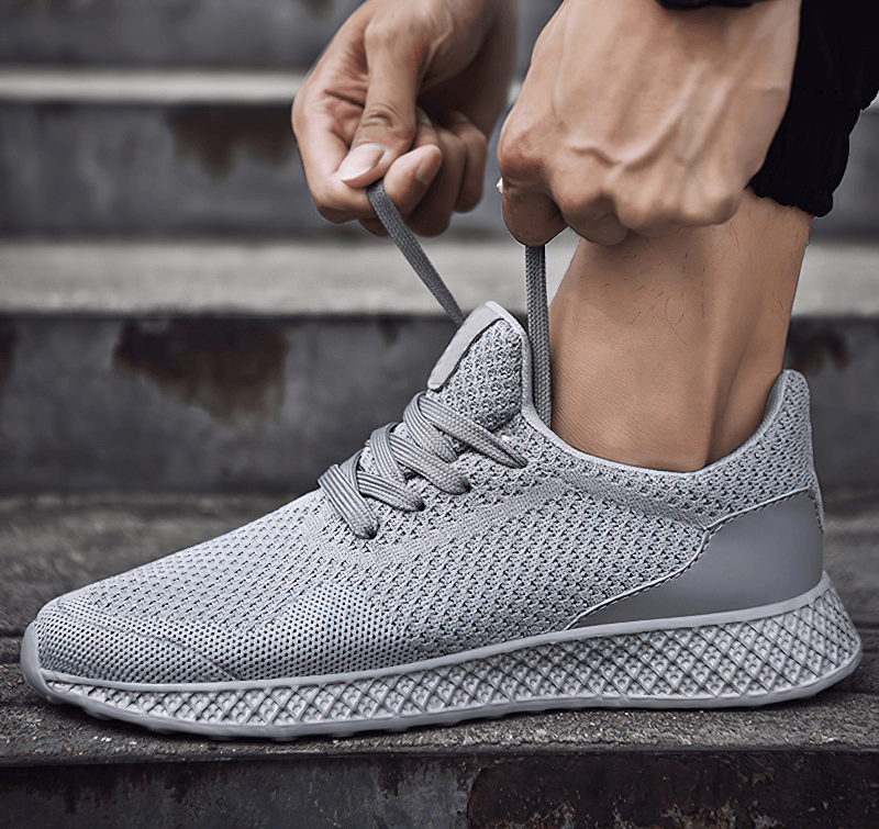 Lightweight mesh men's tenis shoes, perfect for outdoor training with breathable air mesh and EVA cushioning. Flexible and durable design.