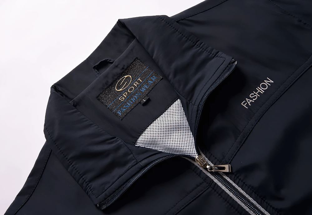 Close-up of navy lightweight sports jacket with full-zip front from the SF2284 tracksuit, highlighting breathable mesh lining and design details.