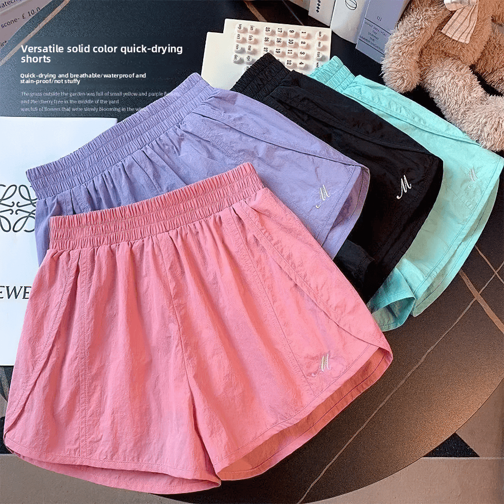 Lightweight Quick-Dry Athletic Shorts - SF3734 in assorted colors displayed on table