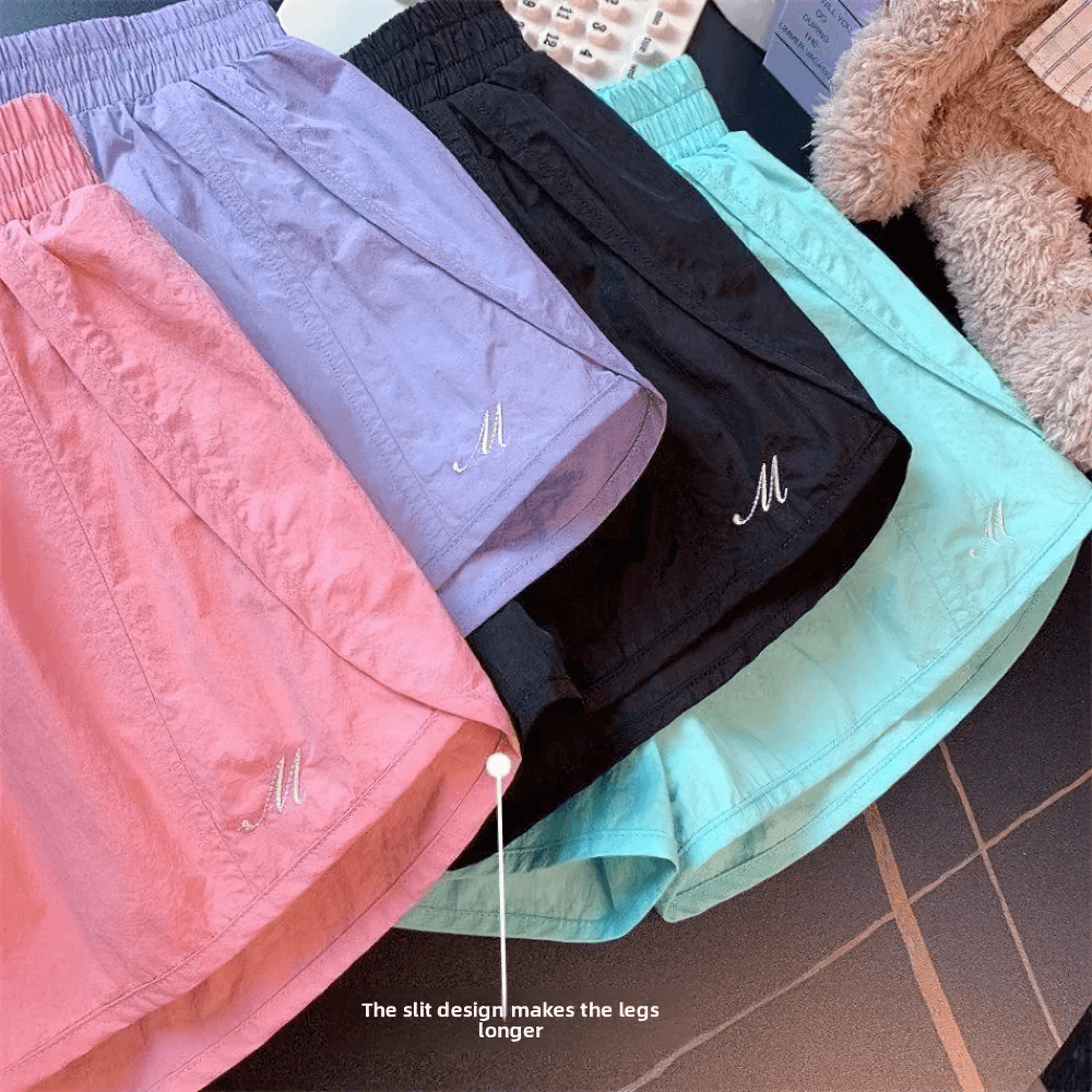 Colorful set of Lightweight Quick-Dry Athletic Shorts - SF3734 with slit design for added mobility and style.