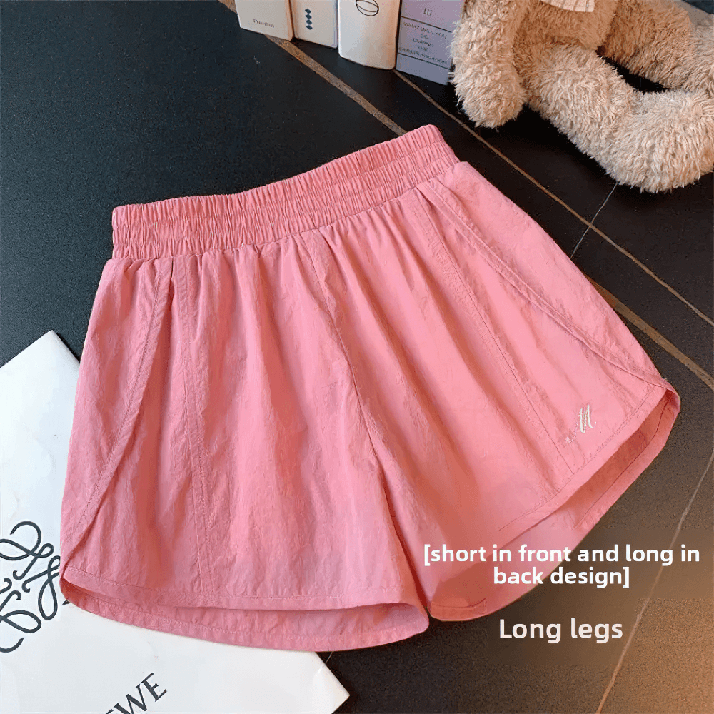 Lightweight Quick-Dry Athletic Shorts - SF3734 in pink with elastic waistband, flowy fit, and embroidered logo, perfect for gym and running.