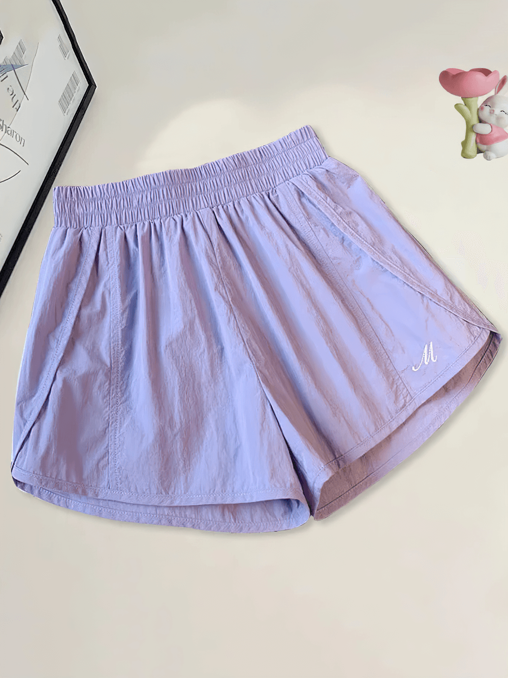 Lightweight Quick-Dry Athletic Shorts - SF3734 in pastel purple with elastic waistband and embroidered logo, perfect for training.