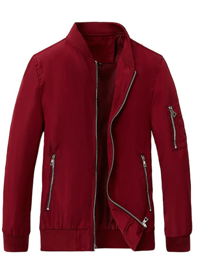 Red lightweight running bomber jacket with zipper details, made from breathable polyester, ideal for men seeking comfort and style.