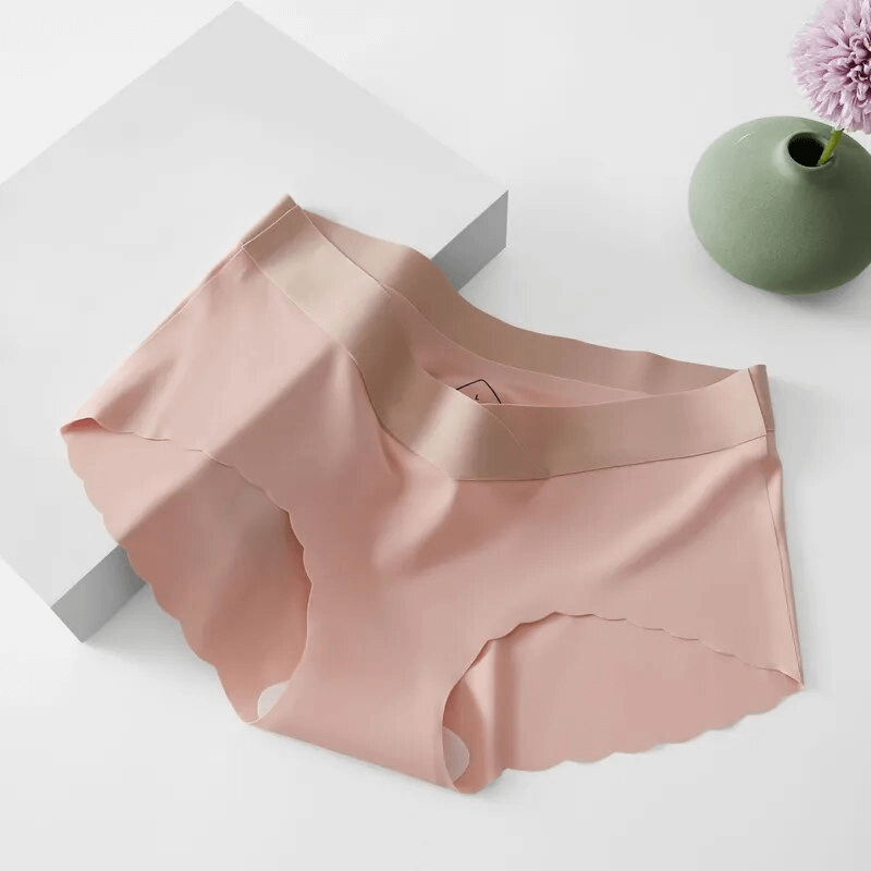 Lightweight seamless low waist panties, peach color, for women. Comfortable, breathable, and stylish underwear, ideal for daily wear.