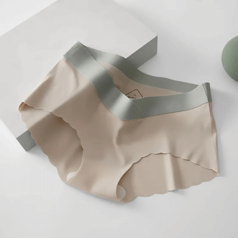Lightweight seamless low waist women's panties in beige with scalloped edges and gray waistband, SF1616 model.