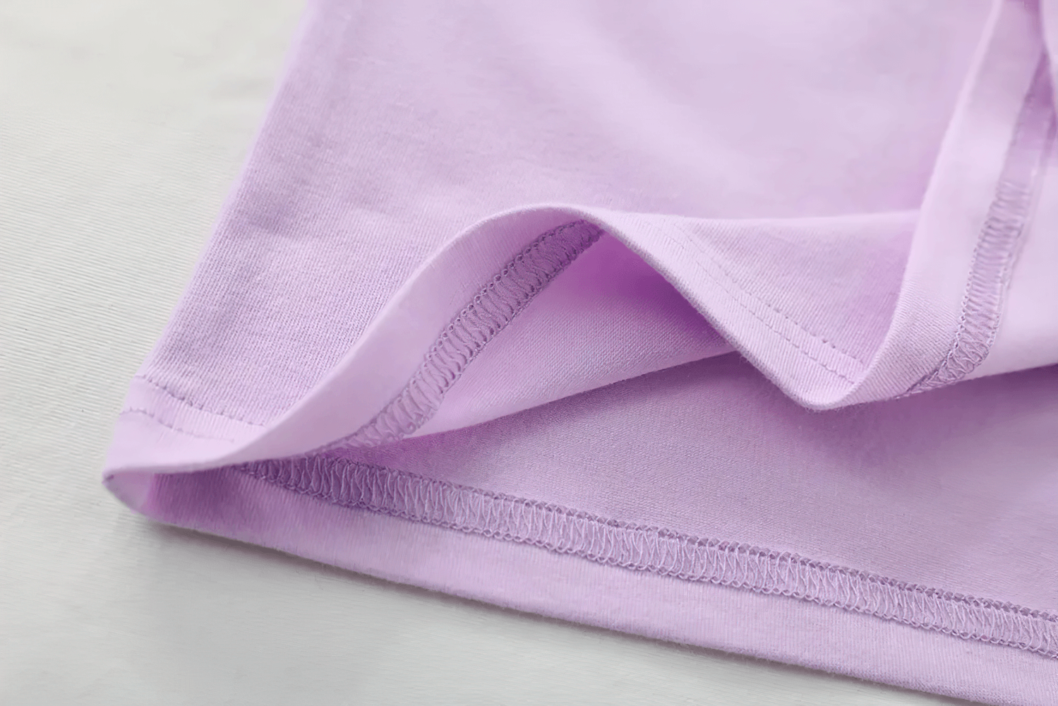 Detailed view of Lightweight Solid Color Short-Sleeve Cotton Tee - SF3851 in soft fabric, showcasing stitching and quality.