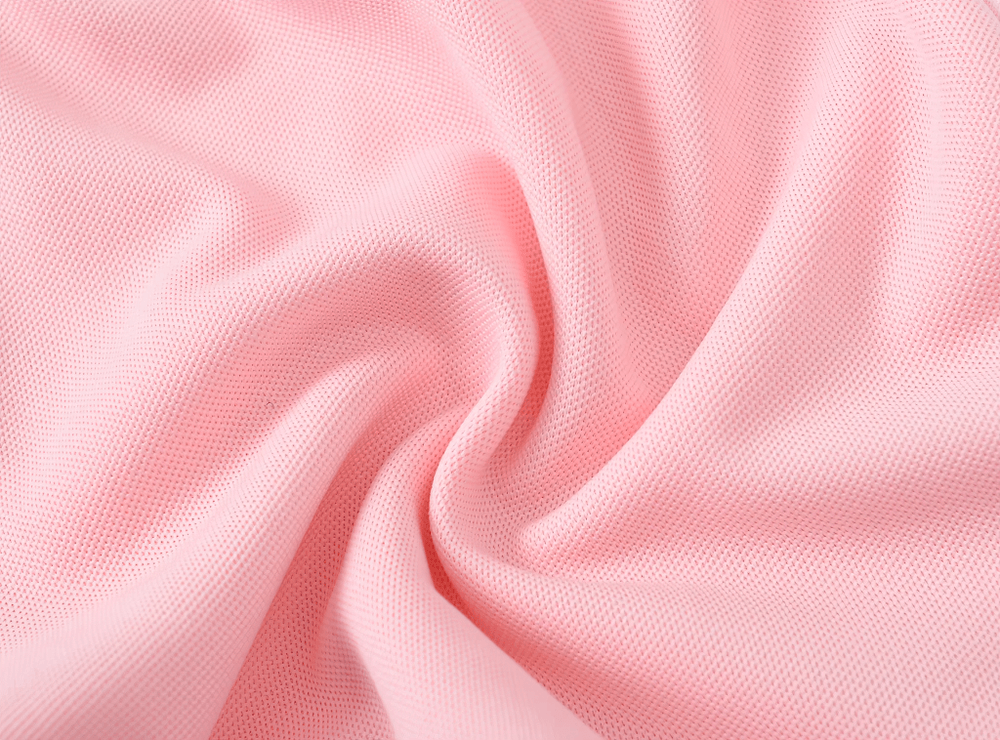 Close-up texture of Lightweight Sports Shorts with Elastic Waistband - SF3784 fabric in pink.