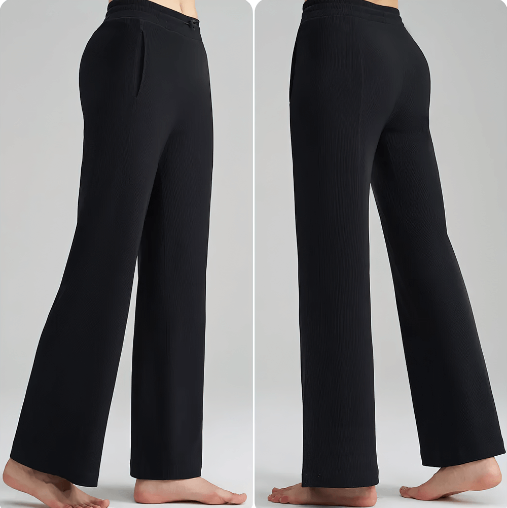 Side and back view of black lightweight wide-leg ribbed lounge pants for women with side pockets and adjustable waistband.