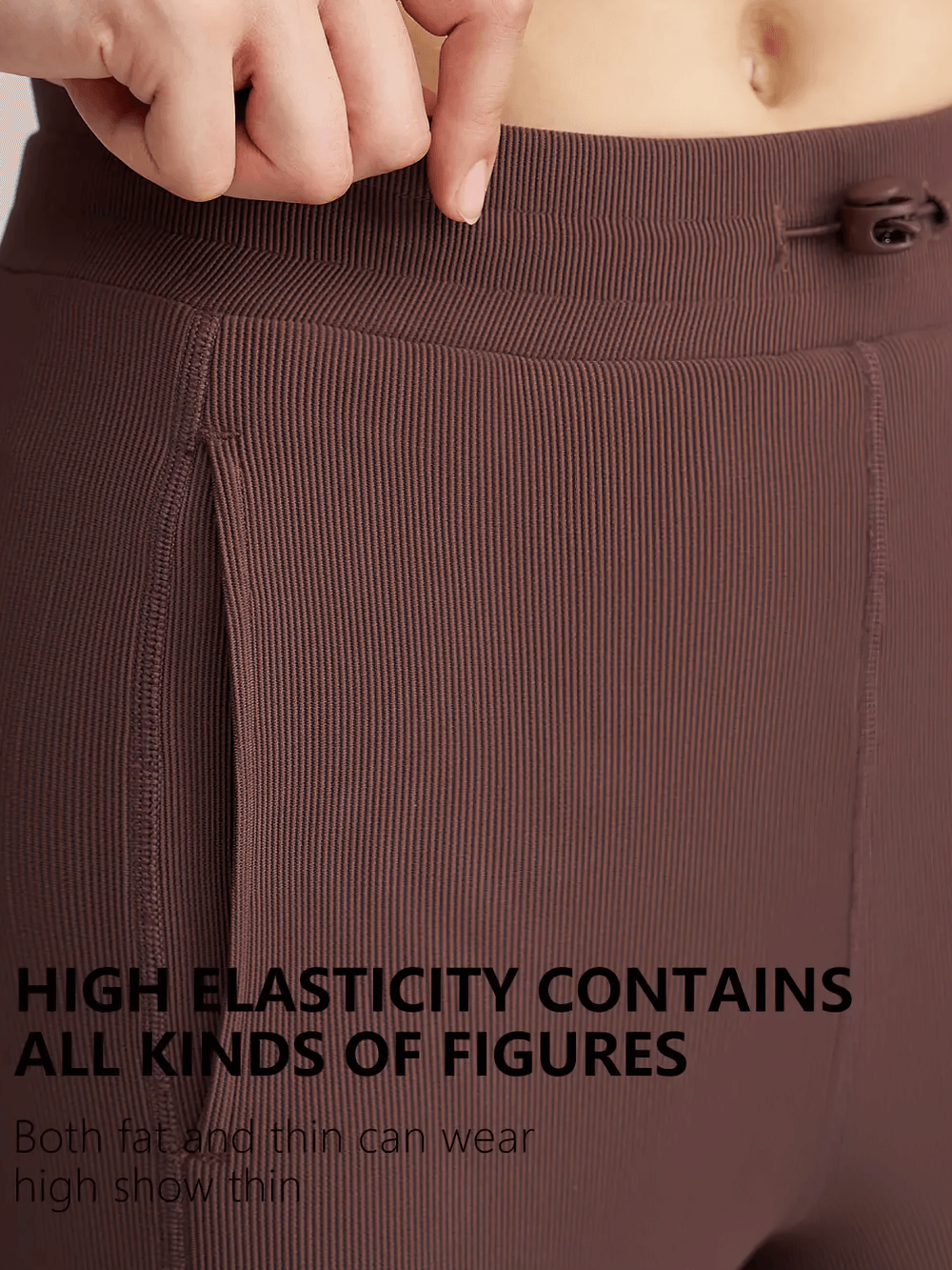 Close-up of lightweight ribbed lounge pants with stretchy waistband and side pockets, showcasing comfort and style for casual wear.