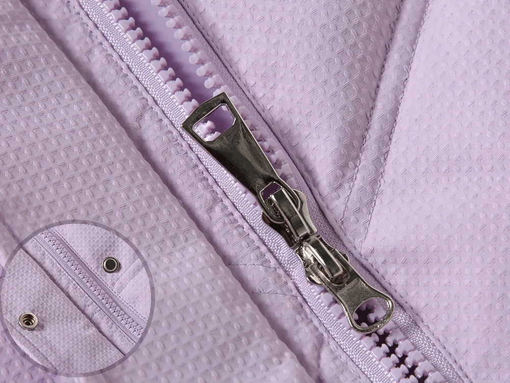 Close-up zipper of Long Down Coat with Hood and Faux Fur Trim - SF3525 showing textured fabric and button detail.