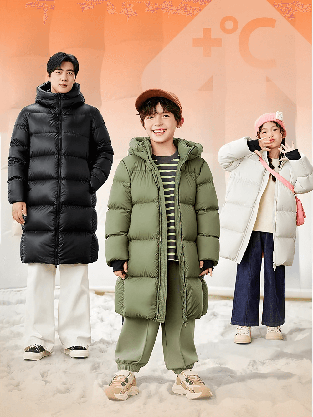 Stylish family in snowy landscape wearing Long Down Jacket with Windproof Hood Design - SF3512, perfect for winter weather.