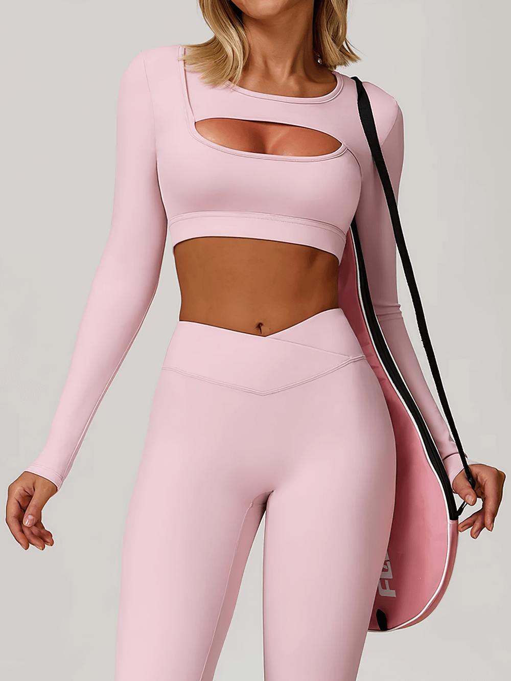 Alt Tag: Long Sleeve Cutout Yoga Crop Top for Women's - SF4384 pink keyhole long-sleeve crop top with matching leggings, sporty and sleek