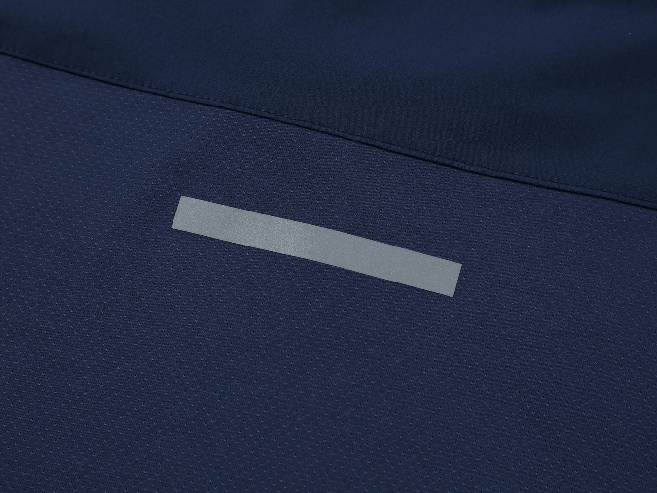 Detail view of the back of Long Sleeve Running Shirt with Sport Panels - SF4638 featuring a sleek design and reflective panel.