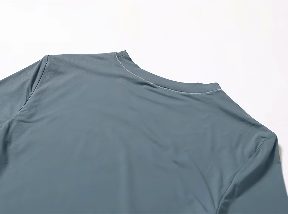 Cloud Hide yoga long sleeve crop top in grey, showcasing breathable nylon-spandex fabric for yoga and gym workouts.