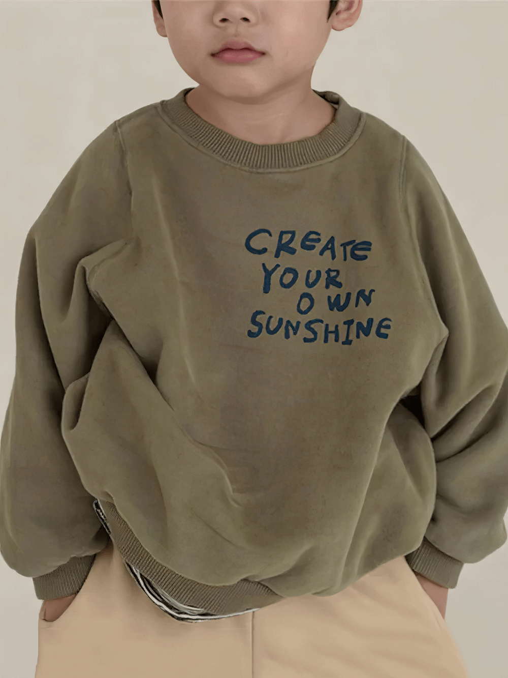 Child wearing Long-Sleeved Sweatshirt With Letter Print - SF3555, "Create Your Own Sunshine" message on cozy fleece fabric.